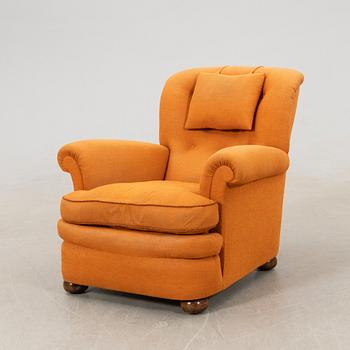 Josef Frank, armchair model no. 336 for the firm Svenskt Tenn, later part of the 20th century.