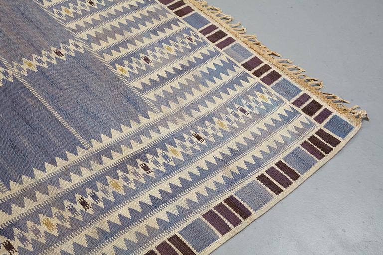 Barbro Nilsson, a carpet, "Salerno blå", flat weave, ca 312 x 201,5-205,5 cm, signed AB MMF BN.