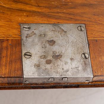 A rococo walnut-veneered and gilt-brass mounted secretaire, later part of the 18th century.