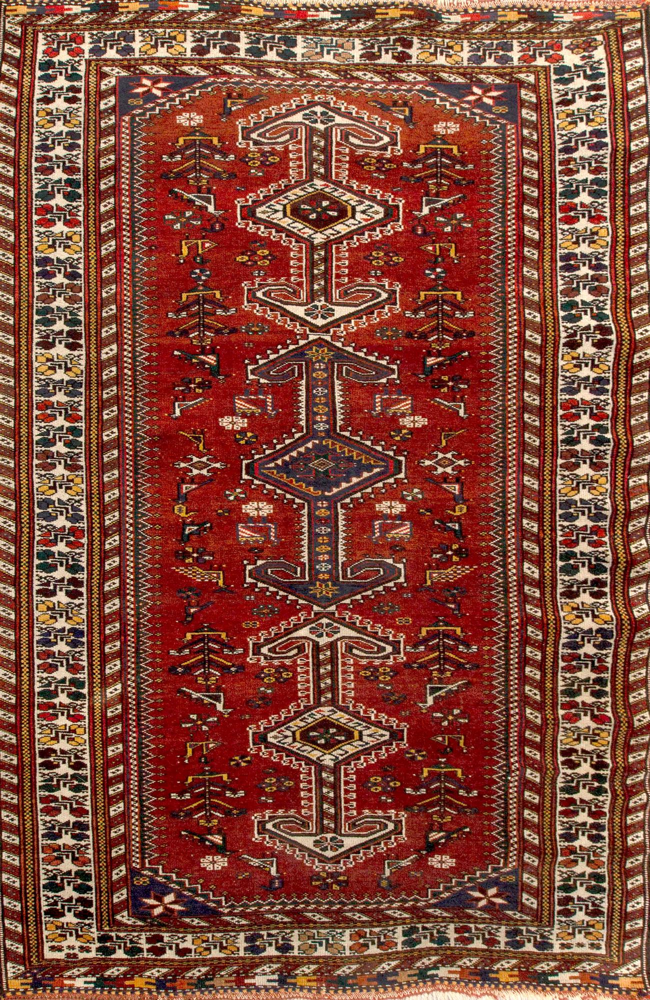 A semiantique/antique Caucasian carpet ca 210 x 130 cm.