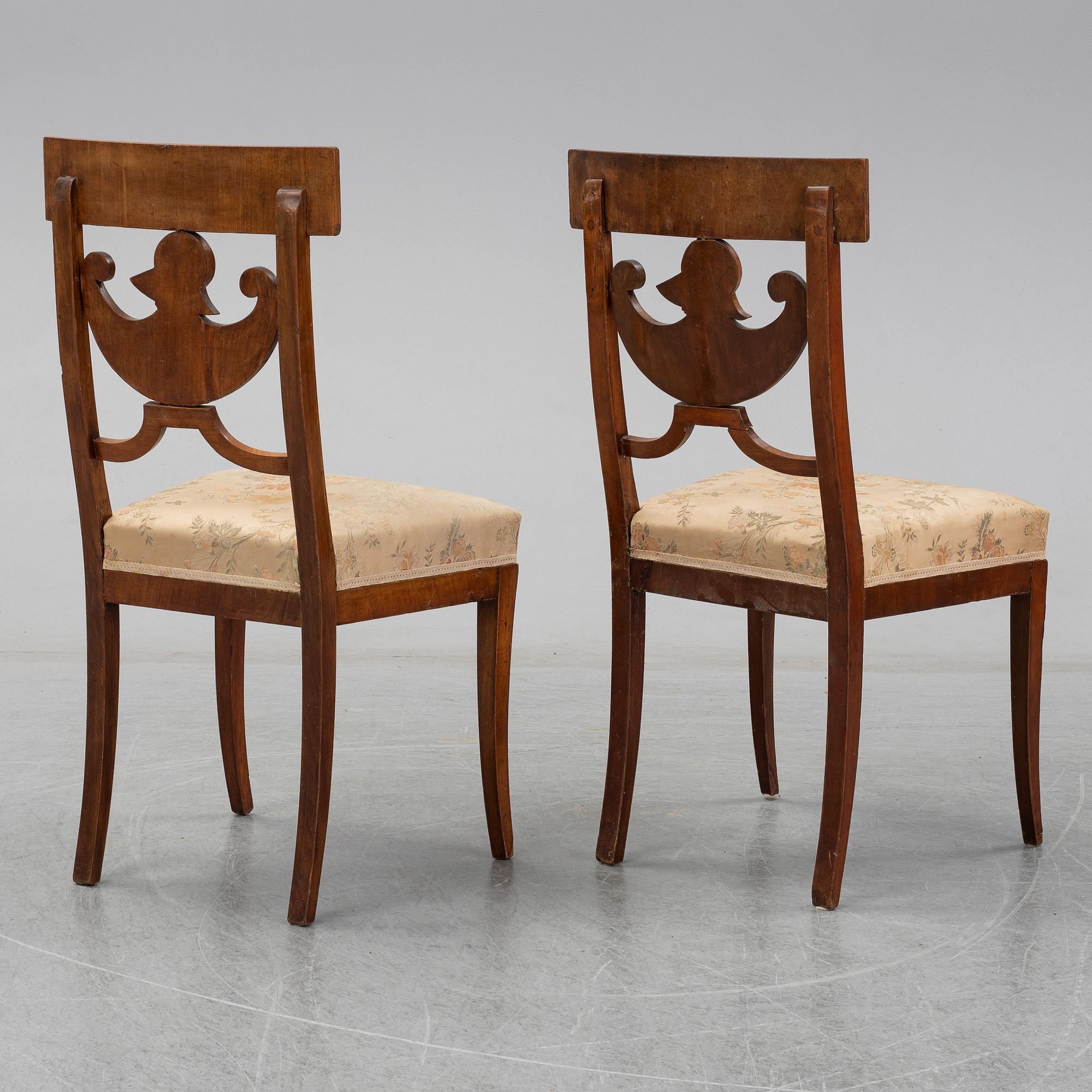 A pair of Royal Empire chairs, first half of the 19th Century.