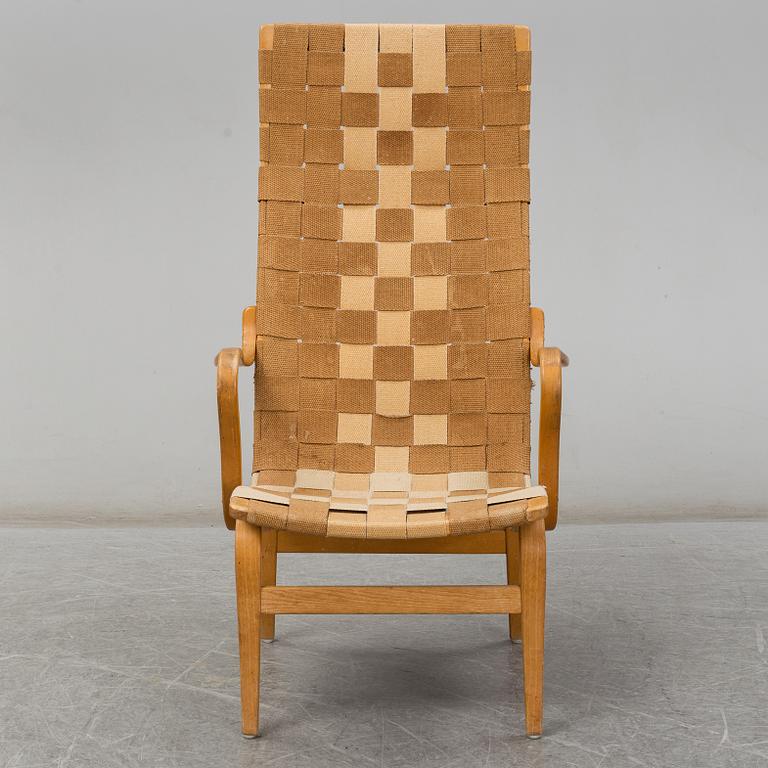 A armchair, model "Eva hög", designed by Bruno Mathsson for Firma Karl Mathsson, dated 1941.