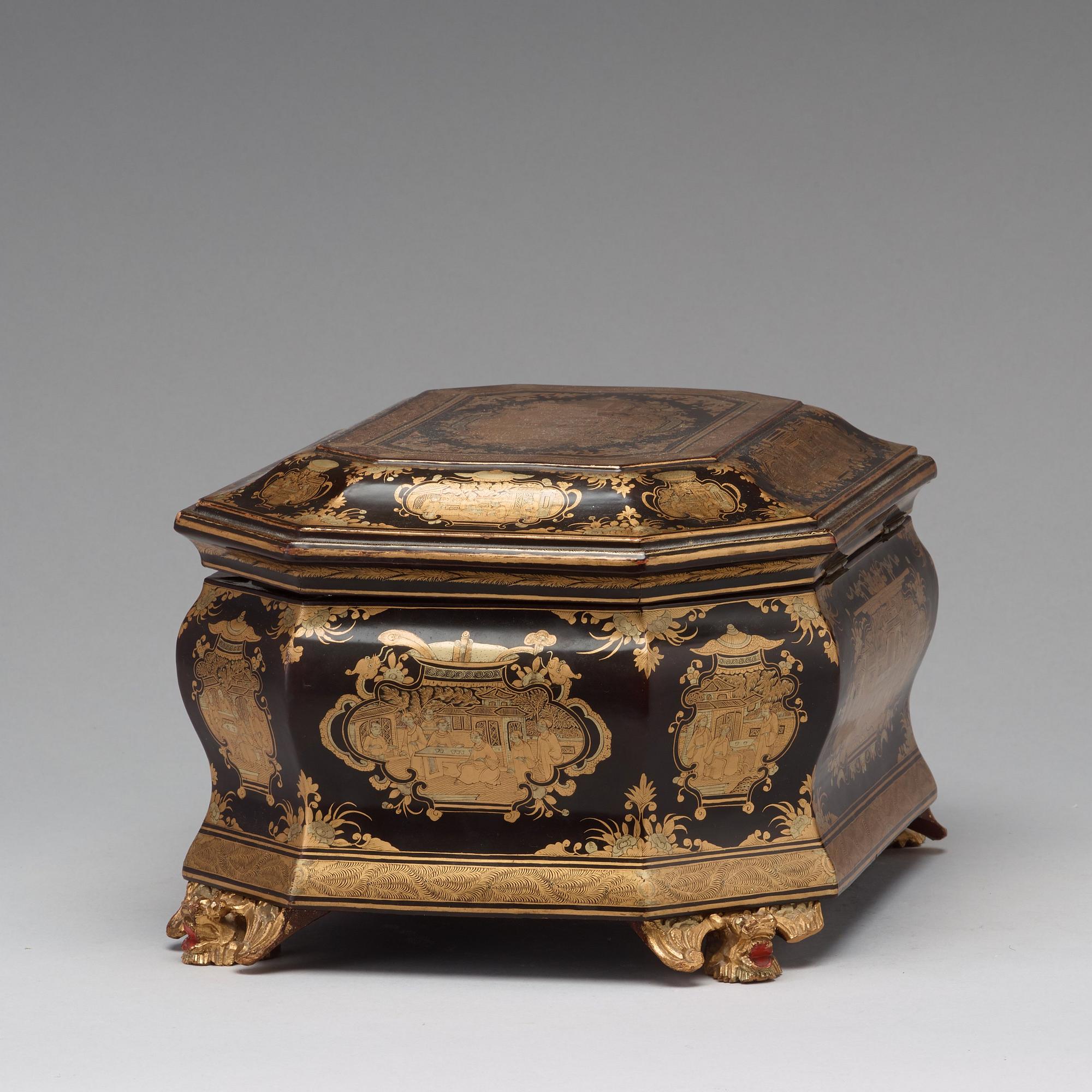 A lacquered tea box with pewter canisters, Qing dynasty, late 19th Century.