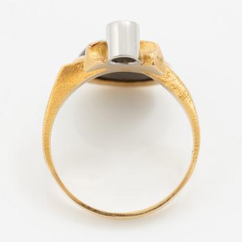Lapponia, ring 18K gold with a blue stone likely of feldspar and a round brilliant-cut diamond, Finland 1978.