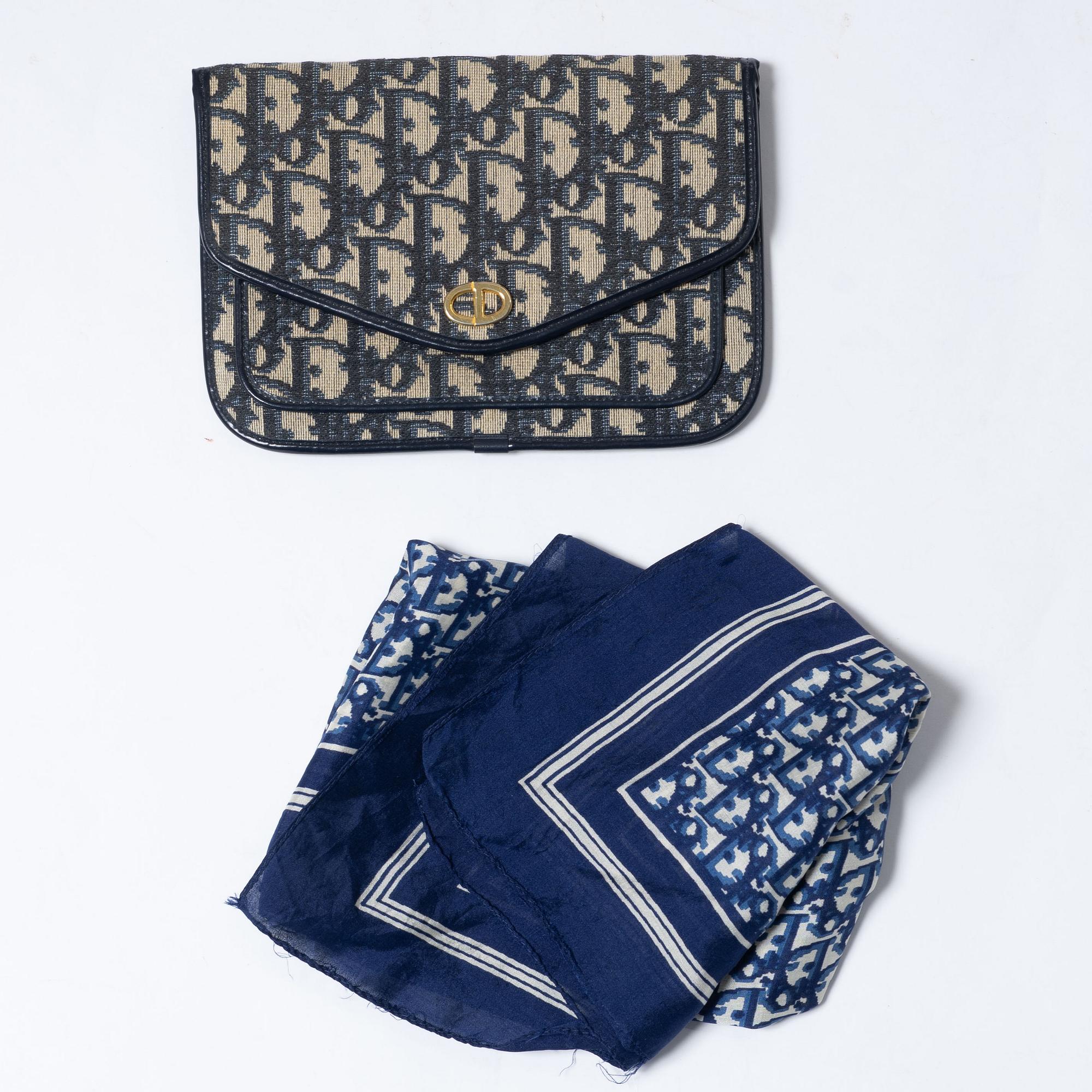 Christian Dior, a clutch and a scarf.