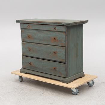 A combined chest of drawers and table, 19th century.