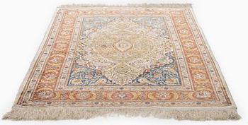 A semi-antique Hereke rug, West Anatolia, c. 135 x 90 cm.