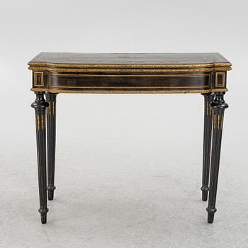 A Louis XVI style games table, circa 1900.