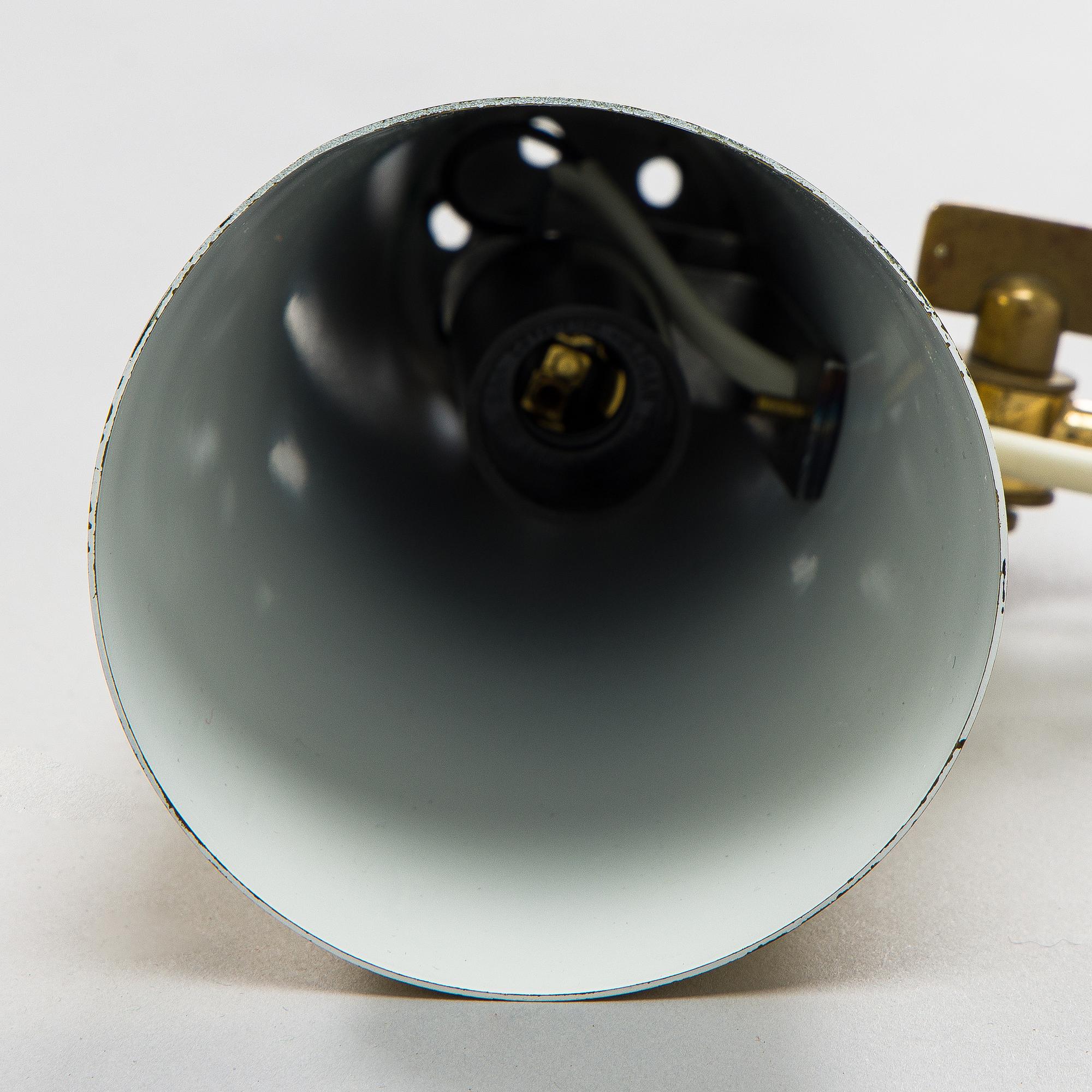 Paavo Tynell, a brass wall light model 9459, Idman, Finland 1960s.