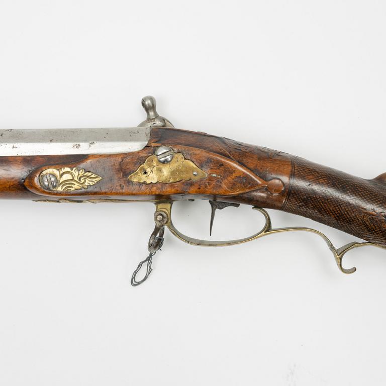 A converted percussion gun, 18th Century.