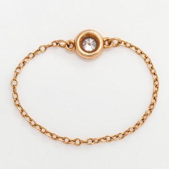 Tiffany & Co, Elsa Peretti, an 18K gold 'Diamonds by The Yard' ring with a brilliant-cut diamond.