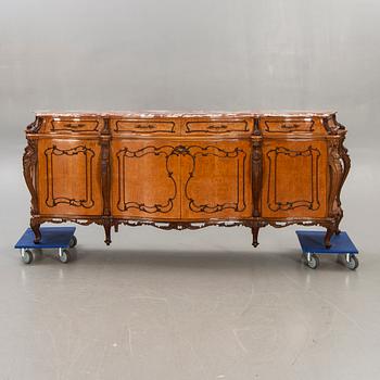 A Louis XV style birch sideboard first half of the 20th century.
