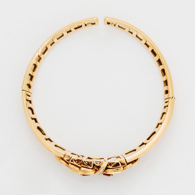 Collier och armband 18K guld med fasettslipade rubiner.