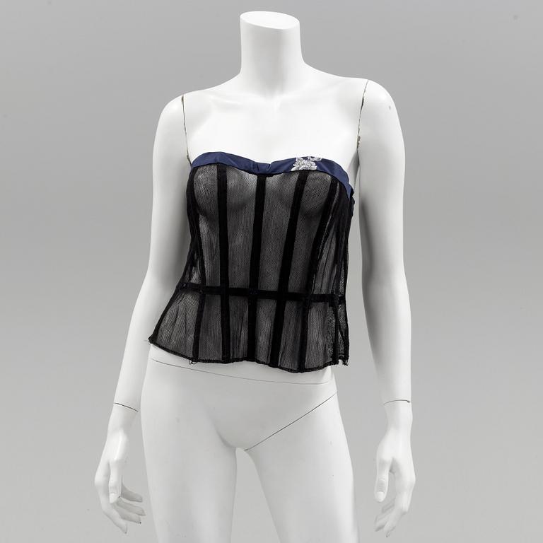 A Christian Dior 1950s midnight blue cocktail dress.