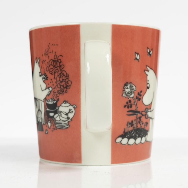 A Moomin mug, 'Dark rosa' with sticker, Arabia, Finland, 1991-99.