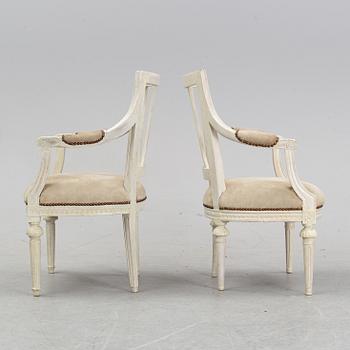 A set of two Gustavian arm chairs from the early 19th Century.
