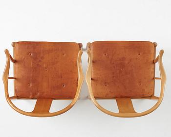 Hans J. Wegner, a pair of "China-Chair" in cherry wood, Fritz Hansen, Denmark, 1969.