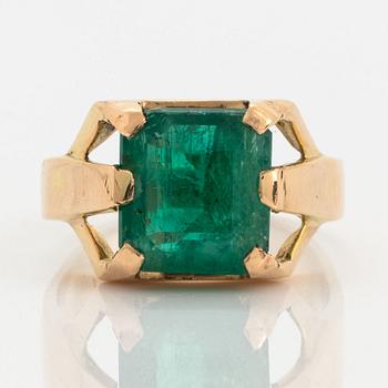 Emerald-cut emerald.
