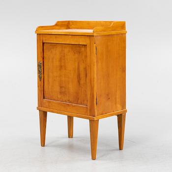 A Gustavian style bedside table, circa 1900.