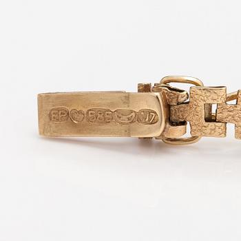 Rannekoru, 14K kultaa. Keravan Kultaseppä, Helsinki 1973.