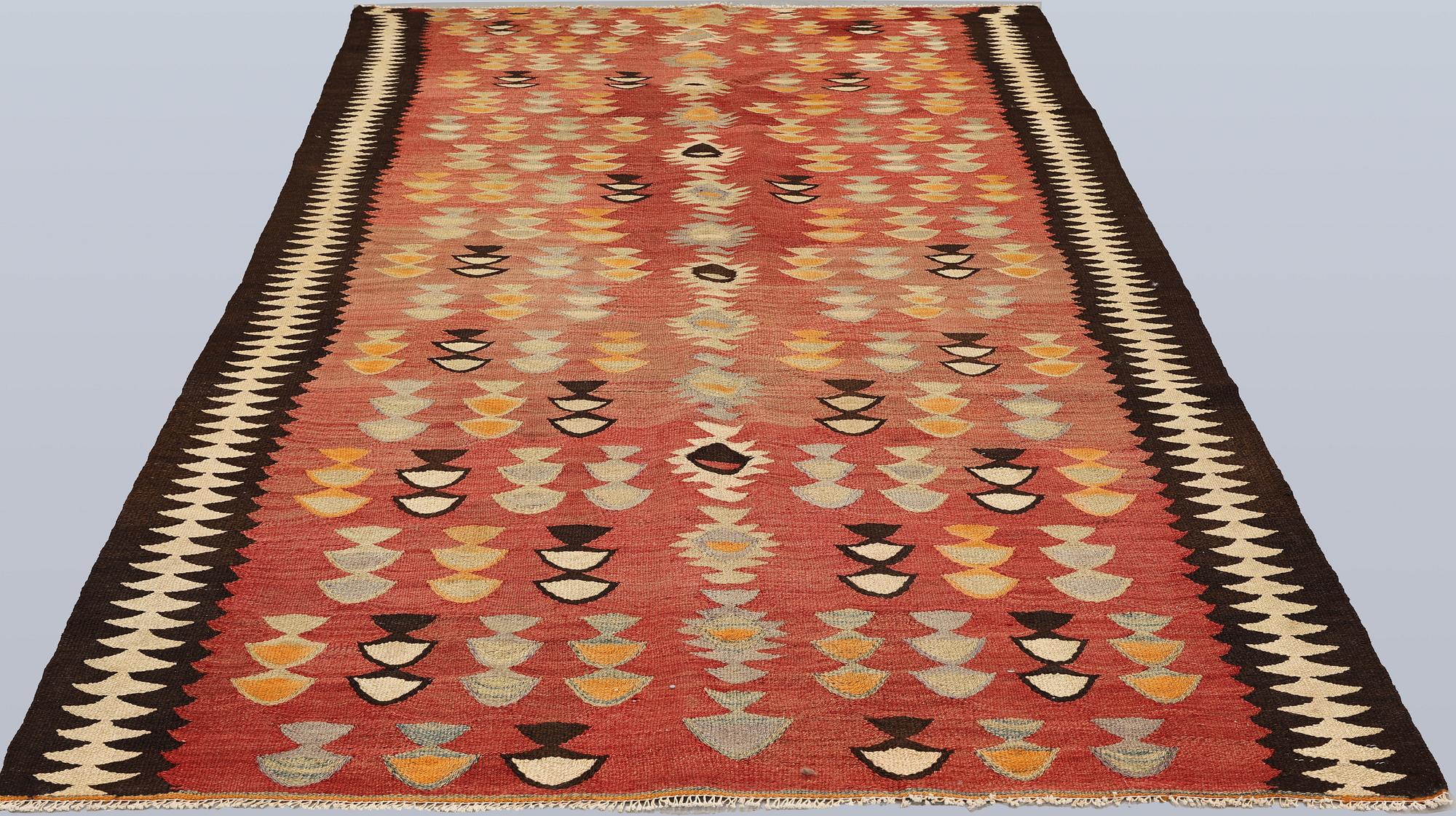 A rug, Persian Nomad Kelim, approx. 280 x 165 cm.