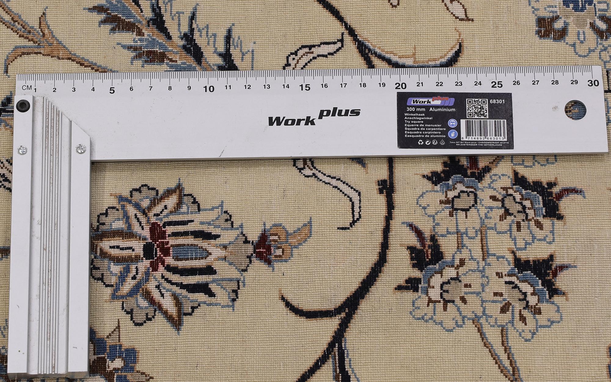 A Nain part silk carpet, 407 x 304 cm.