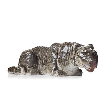 Michael Schilkin, a large stoneware sculpture of a hunting tiger, Arabia, Finland 1940's.