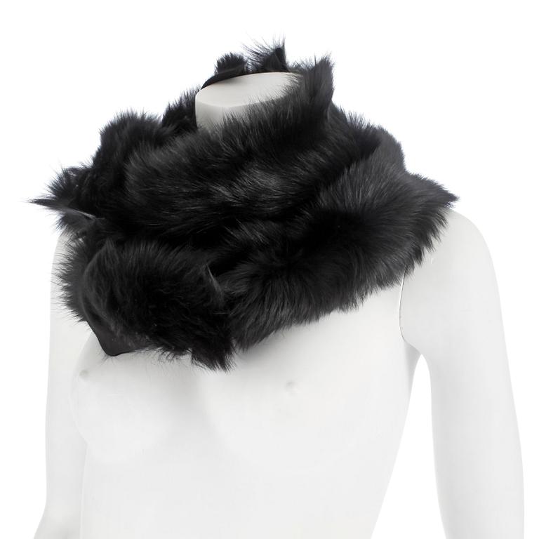 KARL DONOGHUE, a black fur collar.
