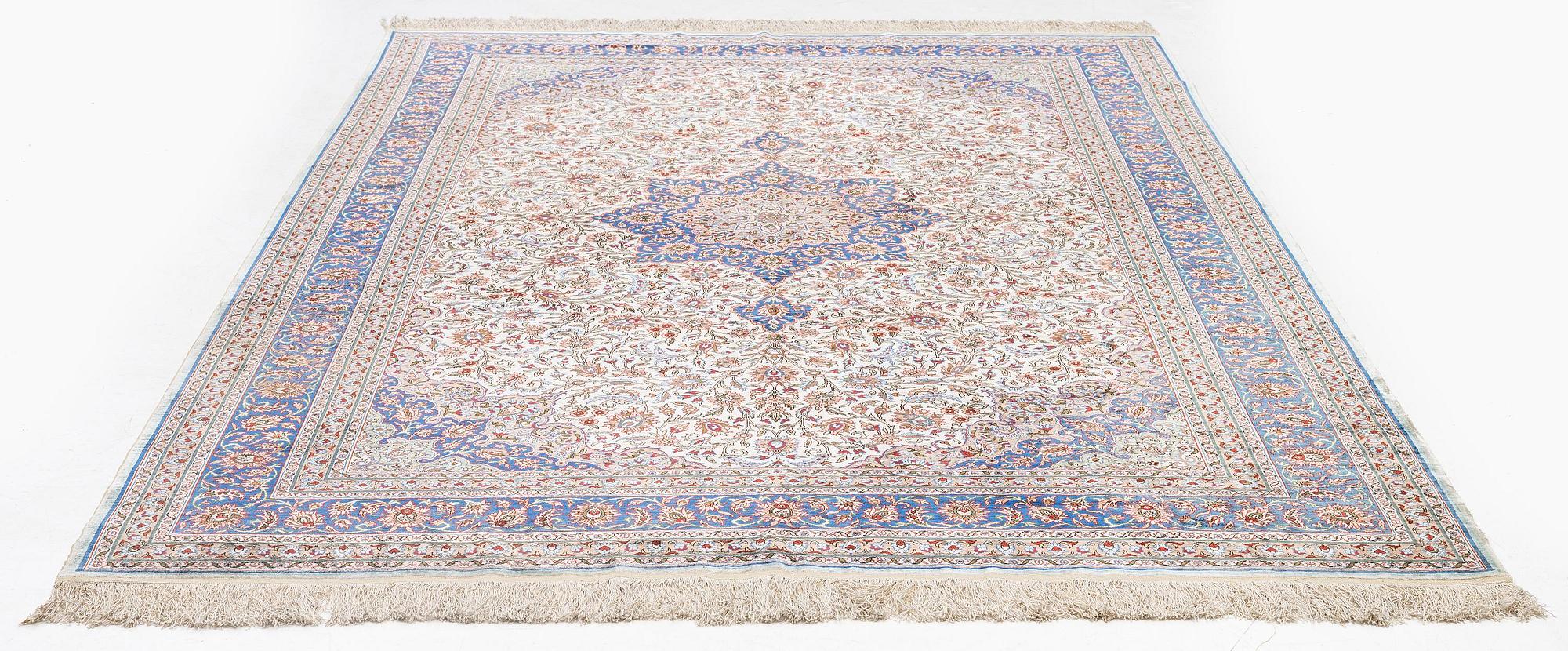 A silk Kayseri/Hereke carpet, c. 310 x 195 cm.