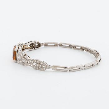 BRACELET platinum and 18K whitegold, 1 citrine, 2 old-cut and 8/8-cut diamonds approx 0,80 ct, G  Dahlgren & Co Malmö.