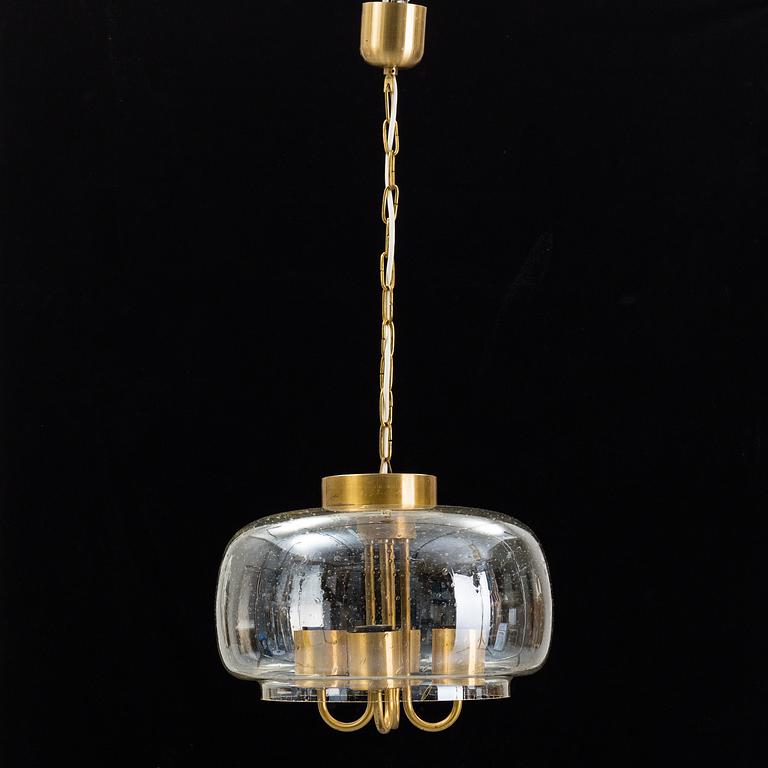 A 1960/70s glass and brass ceiling lamp.