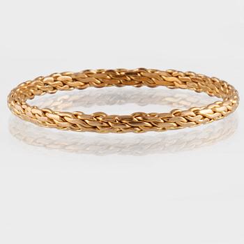ARMRING, 10K guld, utländsk stämpel. Vikt 24,8 gram.