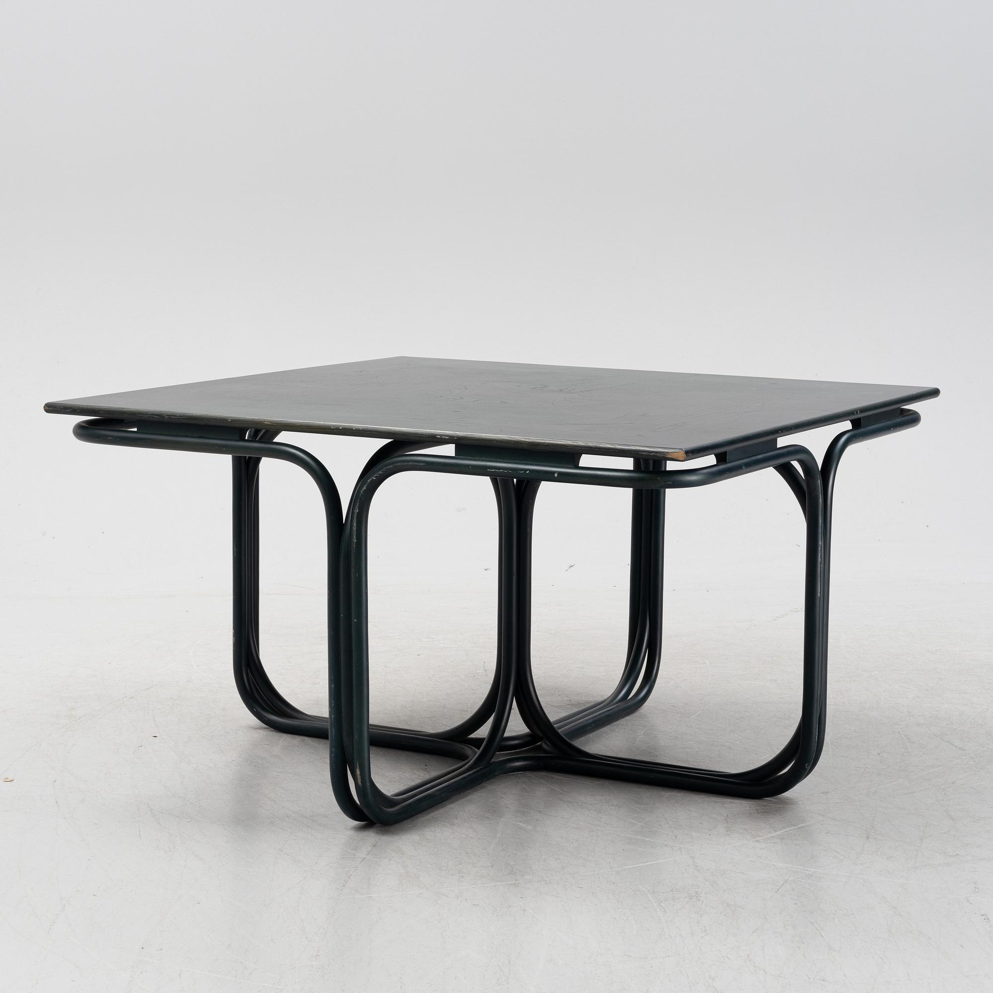 Jan Bocan, a stained beech dining table, late 20th Century.