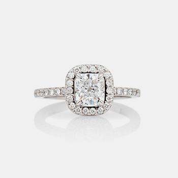 A 1.04 ct cushion-cut diamond ring surrounded by pavé-set brilliant-cut diamonds. Quality D/IF according to certificate.