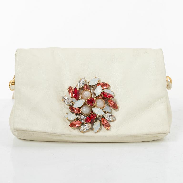 Miu Miu, a handbag/clutch.