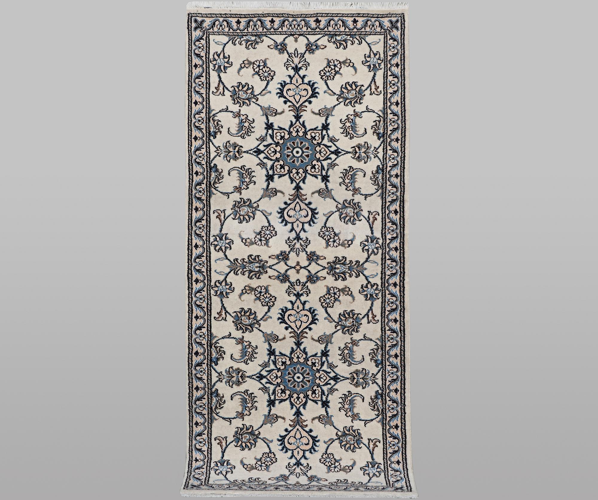 A runner carpet, Nain, part silk, ca 197 x 77 cm.
