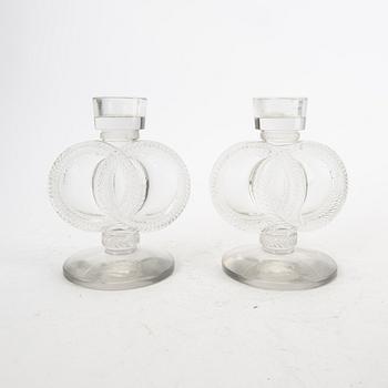 A pair of Lalique glass candle sticks later part of the 20th century.