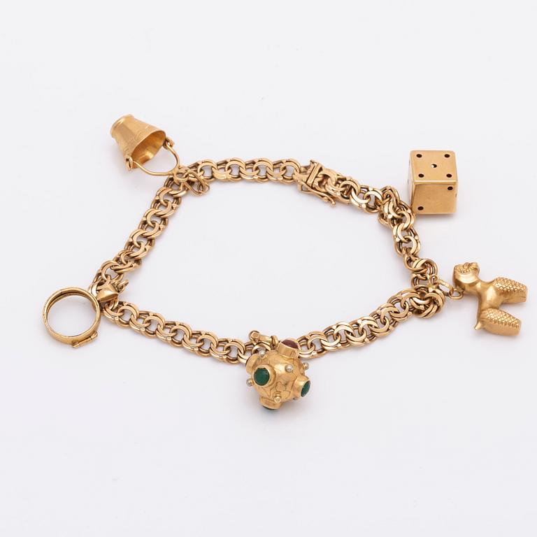 Bracelet 18K gold with charms, 21,8 g, approx 20 x 0,5 cm.