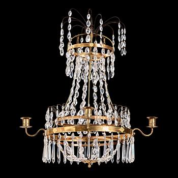 A late Gustavian four-light chandelier, early 19th century.