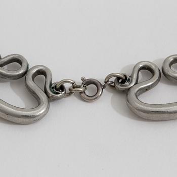 A 1940-50s pewter "The Etrucian necklace" design Estrid Ericson for Svenskt Tenn, Stockholm.