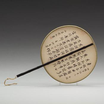 A Chinese fan, ink on silk, circa 1900.