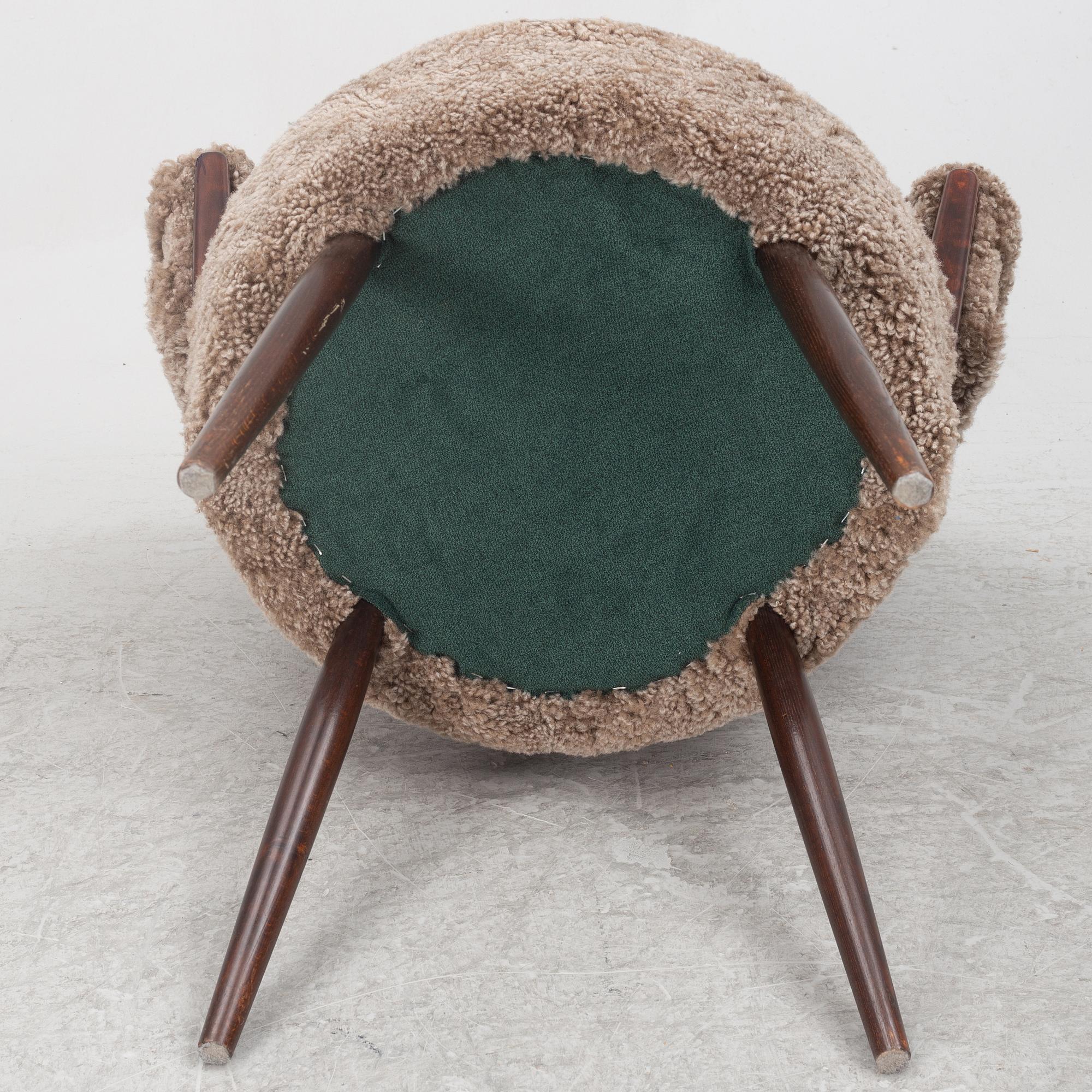 A pair of armchairs, AB Bröderna Biörs Snickerifabrik, mid-20th century.