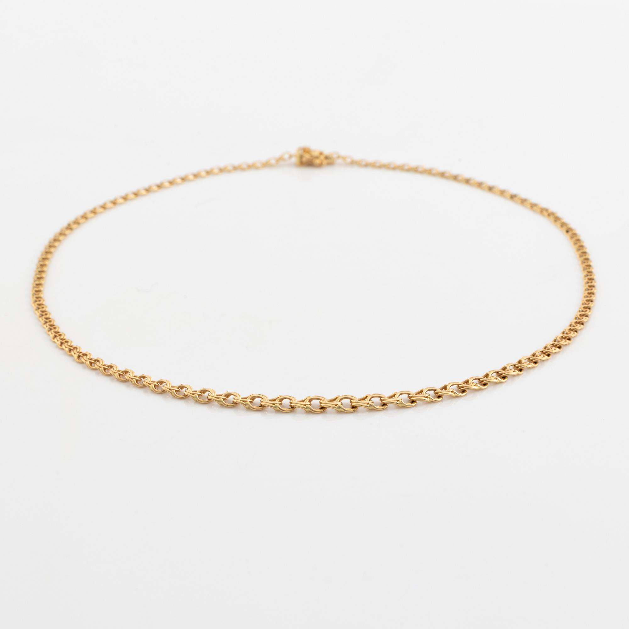 18K gold necklace.