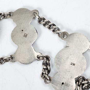 Belt/waistband and two brooches, silver, Russia 1896–1908.