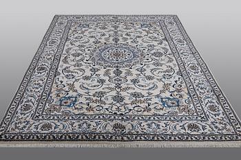 A carpet, Nain, parrt silk, ca 287 x 200 cm.