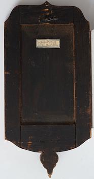 A pair of Late Baroque two-light girandole mirrors.