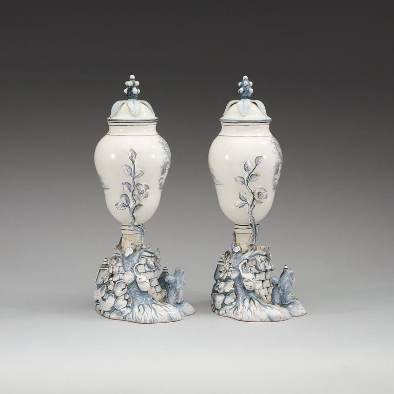 A pair of Swedish Marieberg faience vases with covers, 18th Century.