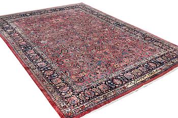 An antique Saber carpet, signed, a. 405 x 295 cm.