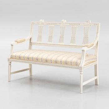 A sofa, three chairs and a table, Gustaivan style and of the Gustavian period, 19th-20th century.