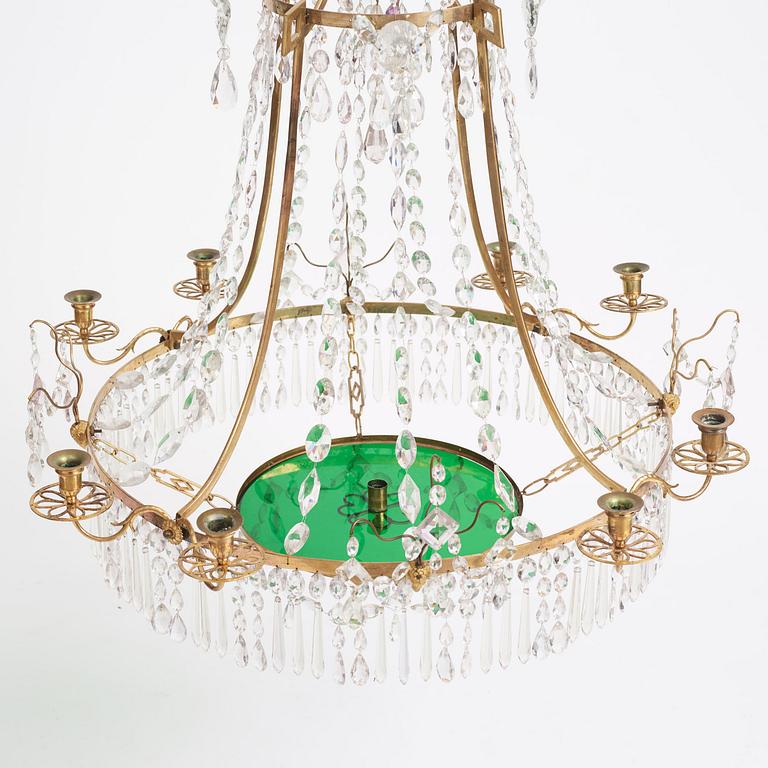 A German Louis XVI ormolu and cut-glass nine-light chandelier attributed to Johann Christoph Ermisch, late 18th century.